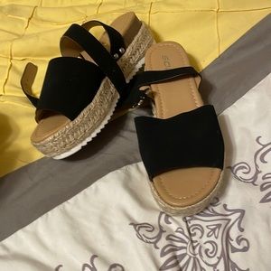 Size 7 black flats made by soda